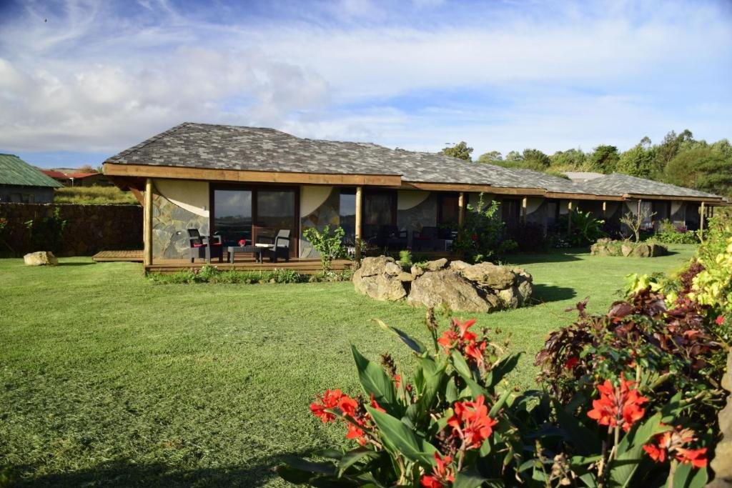 Takarua Lodge rodeado de jardines y flores